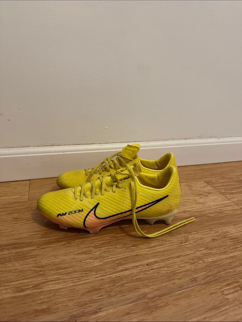 Nike Women Yellow Soccer Cleats with Black Swoosh